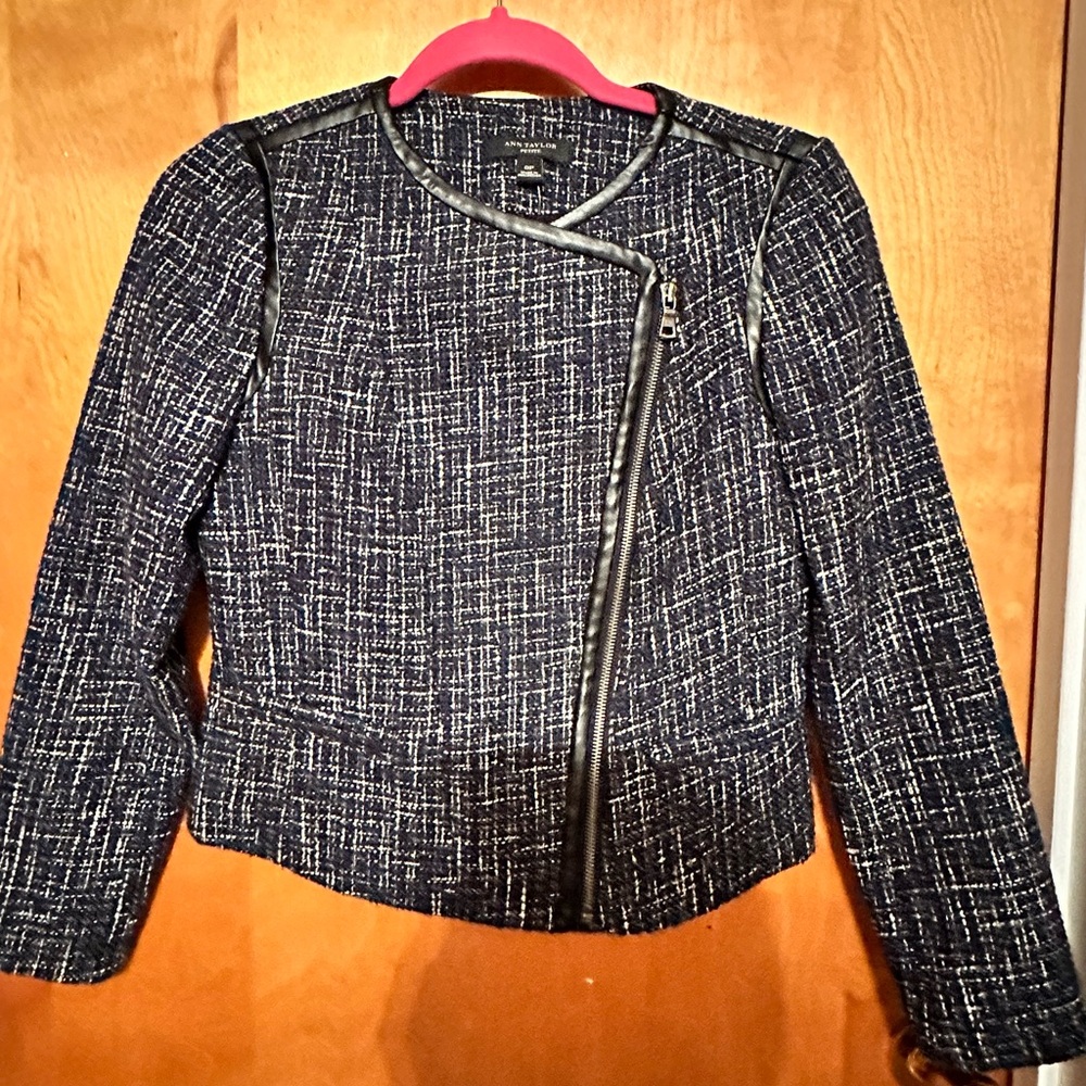 0P. Asymmetrical zipper, motorcycle style, tweed jacket.